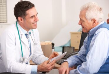 Older man seeing primary care physician